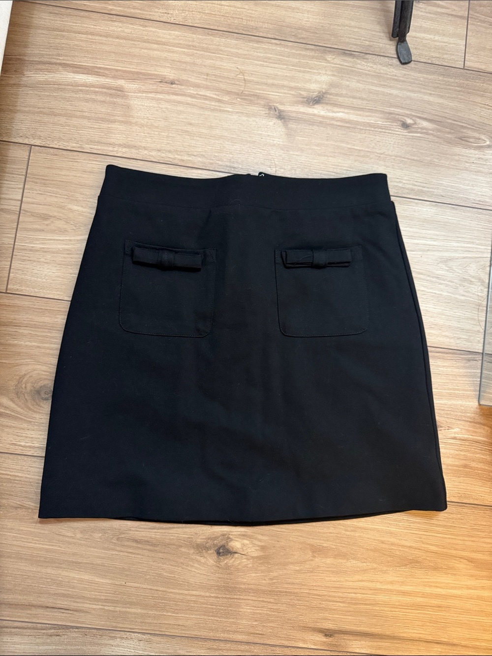 CeCe Black Mini Skirt with Front Pocket Bows